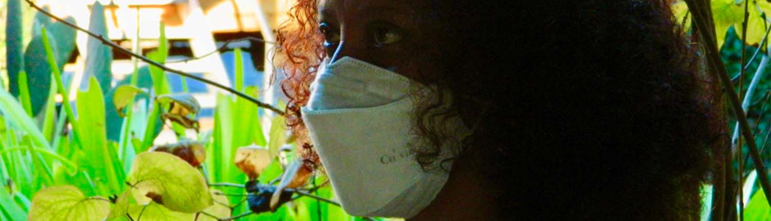 Woman wearing Virus buster mask by Coppermedics